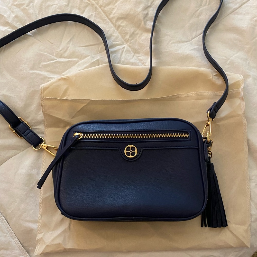 IMAN. Navy blue faux leather crossbody